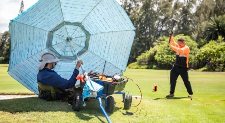 Field technicians conducting a geophysical survey for bedrock depth mapping using resistivity equipment to determine depth to bedrock and evaluate subsurface conditions for site design and stability analysis.